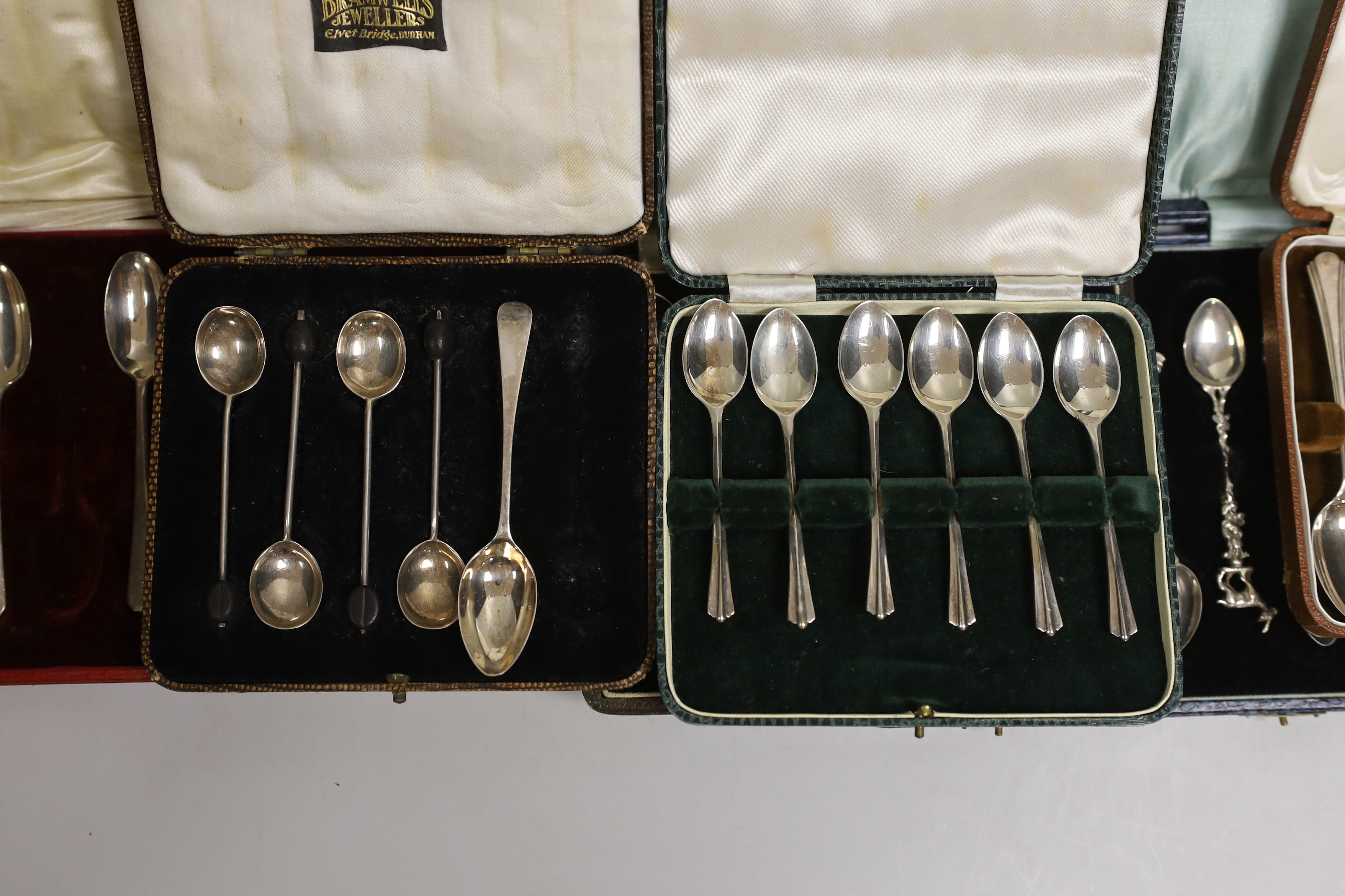 Seven various cased part sets of silver cutlery to include teaspoons etc., together with a cased set of six sterling silver faux bamboo coffee spoons with semi-precious stone tablet inset terminals.